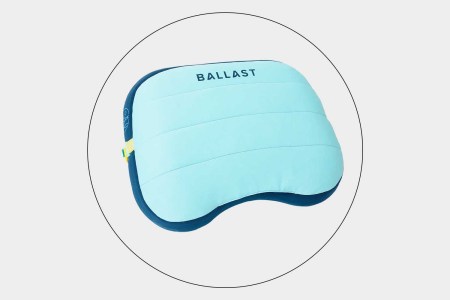 Ballast Beach Pillow in a circle on a grey background.